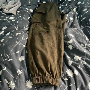 Green carpenter style pants